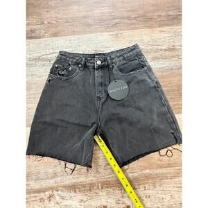 White Fox Boutique black denim shorts distressed design and raw hem sz Small